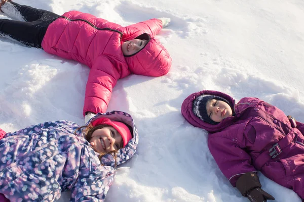 Three angels on the snow — Stock Photo, Image