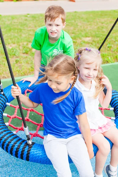 Siblings in the park in the summer outdoors — Stock Photo, Image