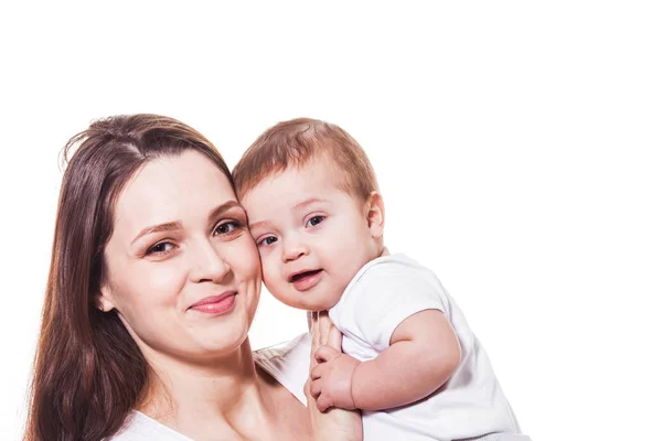 Adorable mother and child looking at the camera — Stock Photo, Image
