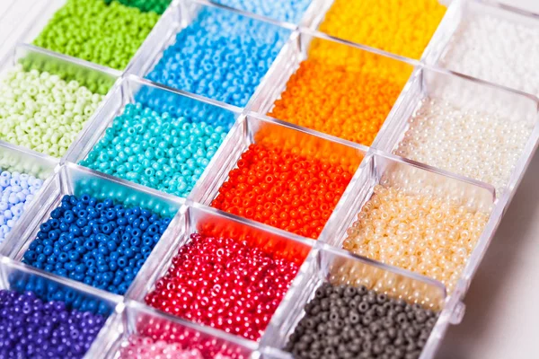 Various beads close up in the box — Stock Photo, Image