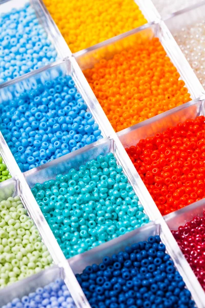 Various beads close up in the box — Stock Photo, Image