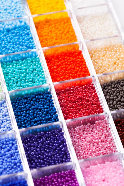 Various beads close up in the box — Stock Photo, Image