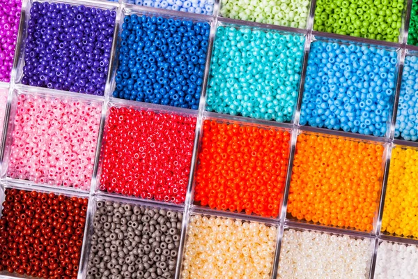 Various colour beads close up in the box — Stock Photo, Image