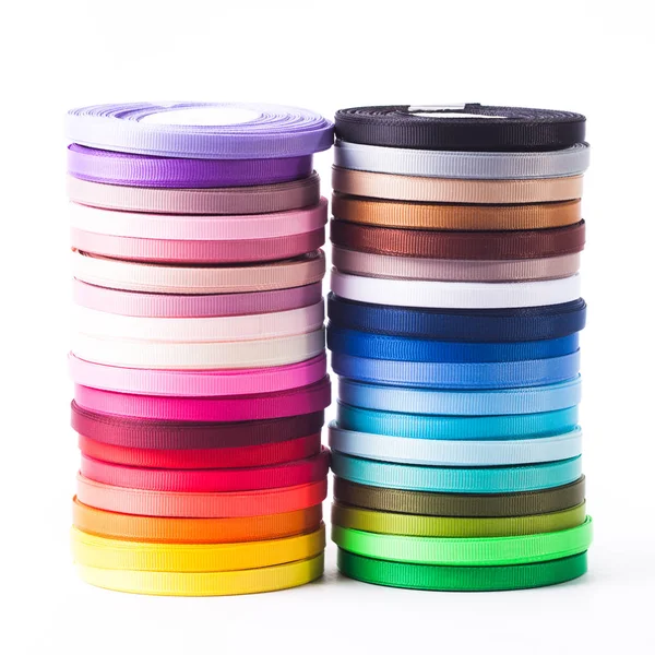 The ribbons bobbins isolated on the white — Stock Photo, Image