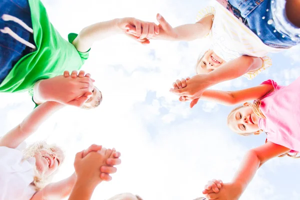 Close view of childrens hands put together — Stock Photo, Image