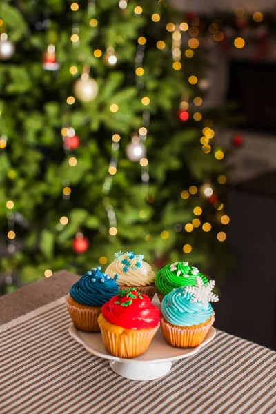 Christmas cupcakes on the cakestand on the table — Stock Photo, Image