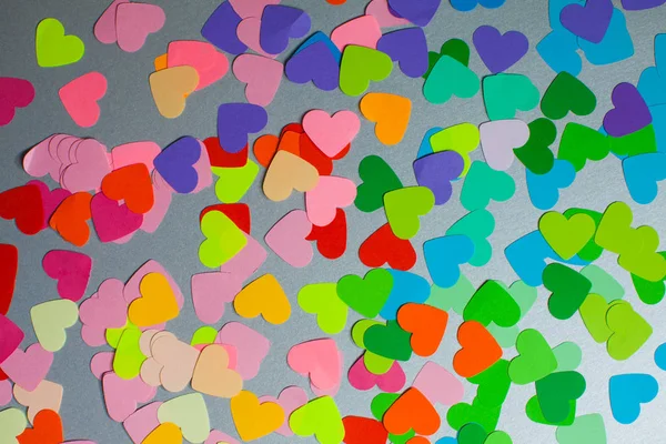 Papel arco-íris cores corações como um padrão de design — Fotografia de Stock