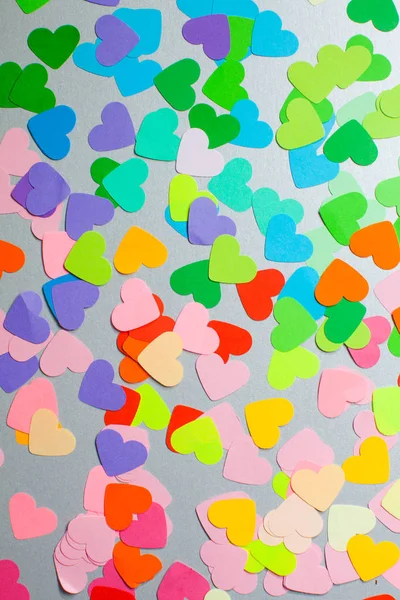 Tasarım için bir desen olarak Kağıt gökkuşağı renkleri kalpler — Stok fotoğraf