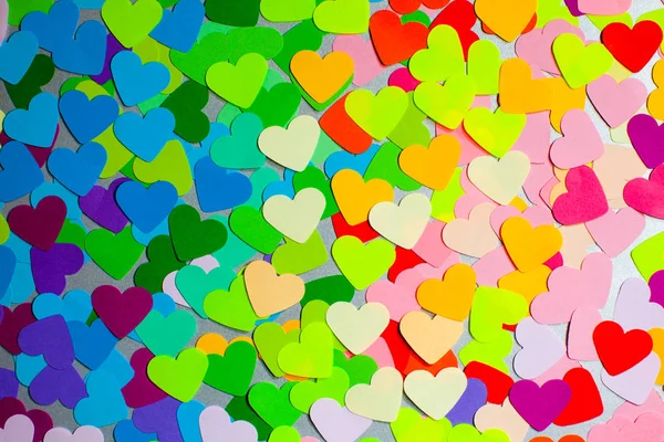 Tasarım için bir desen olarak Kağıt gökkuşağı renkleri kalpler — Stok fotoğraf