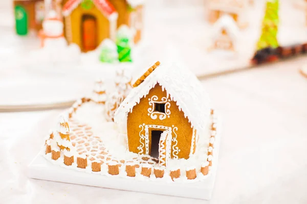 Gingerbread house in the Christmas village on the fair — Stock Photo, Image