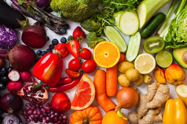 Rainbow colored fruits and vegetables top view