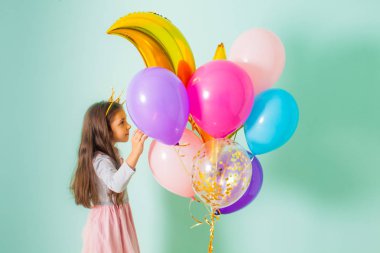 pretty joyful kid girl on birthday party