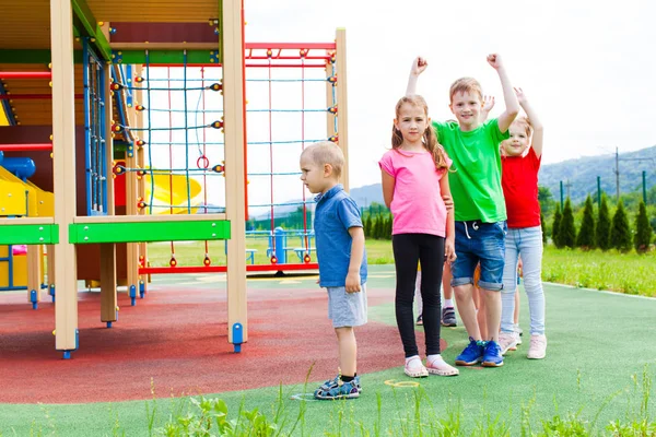 Friends at afterschool summer camp playing outdoor — Stock Photo, Image