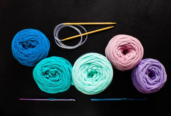 Top view heap of textile yarn balls