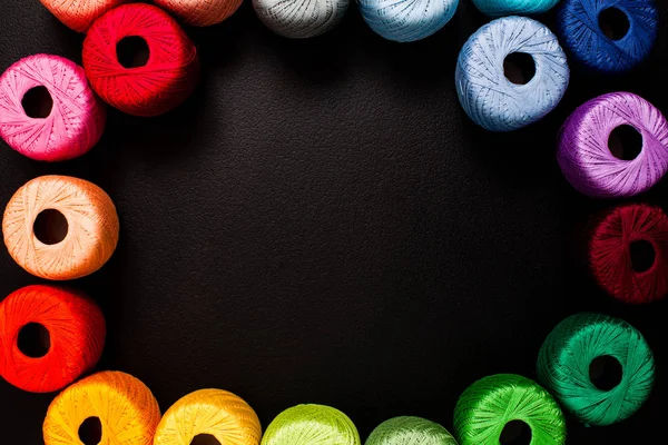 All colors yarn for knitting in the borders with place for text — Stock Photo, Image