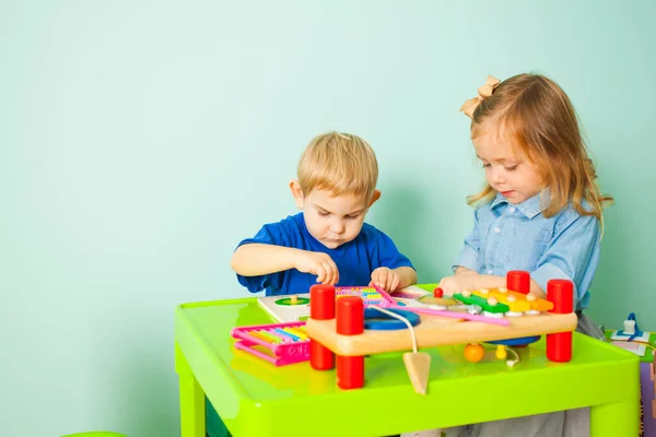 Little childdren girl playing in kindergarten in preschool Class. — ストック写真