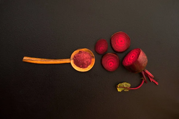 Top view of Beetroot Powder in wooden spoon — Stock Photo, Image