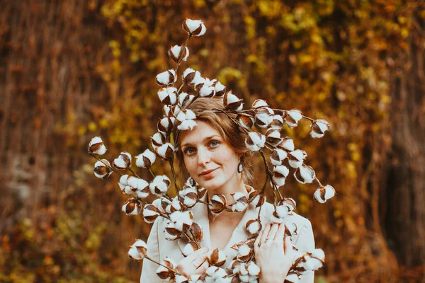 Autumn portrait sensual young woman. Girl holding beautiful cotton flowers — Stock Photo, Image