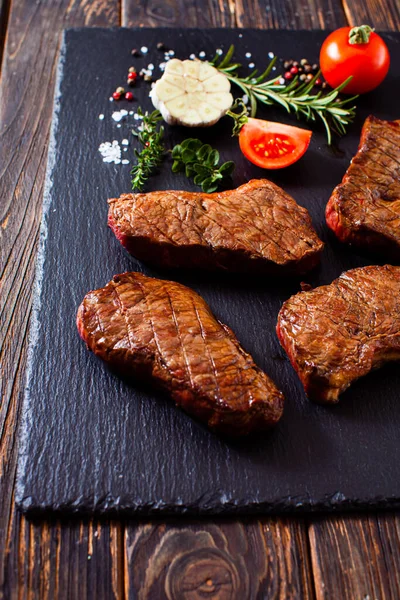 Cooked tasty steak with spices as a culinary art — Stock Photo, Image
