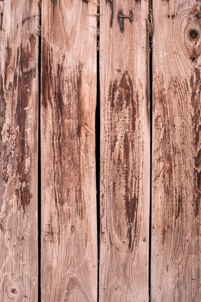 Detailní vertikální dřevěná prkna, stará a ošlehaná — Stock fotografie