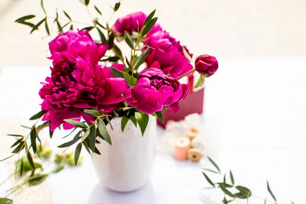 Vase of pink peony on a white background — Stock Photo, Image