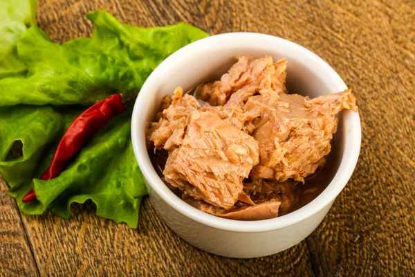 Canned tuna fish in the bowl ready for cooking