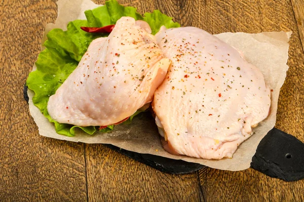 Raw chicken thighs