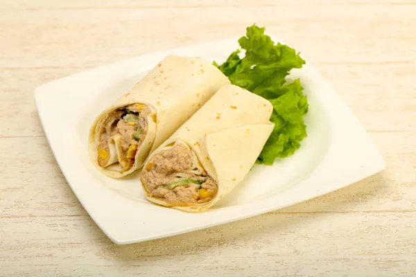 Tuna bread roll served with salad leaves