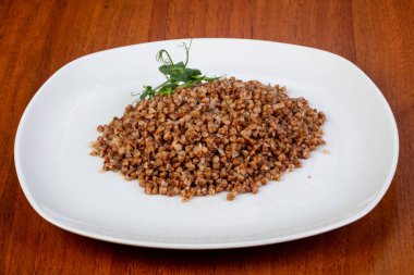 Lezzetli haşlanmış Buğday lapası otlar ile