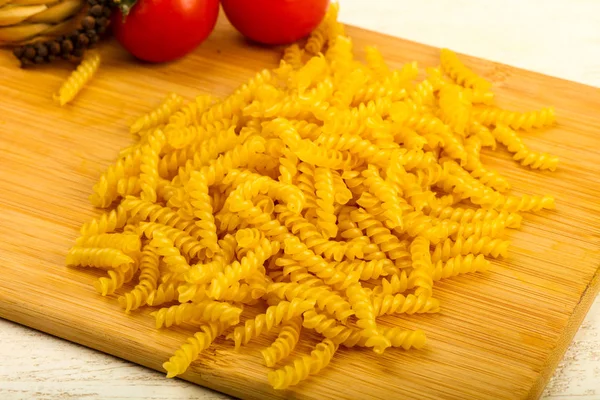 Raw Fussili Pasta Wooden Background — Stock Photo, Image