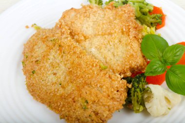 Susam ve haşlanmış sebzeler ile tavuk