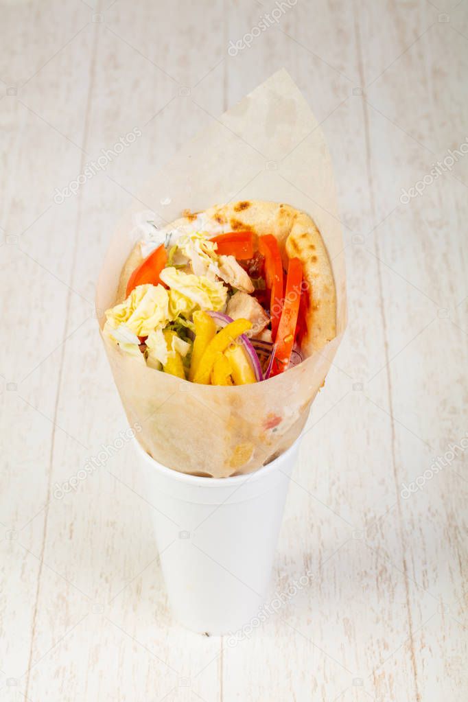 Tasty gyros with tomatos lettuce and meat