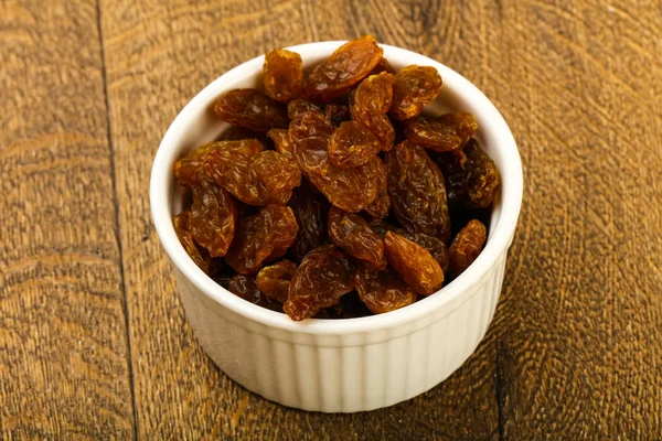 Raisin Sec Dans Bol Sur Fond Bois — Photo