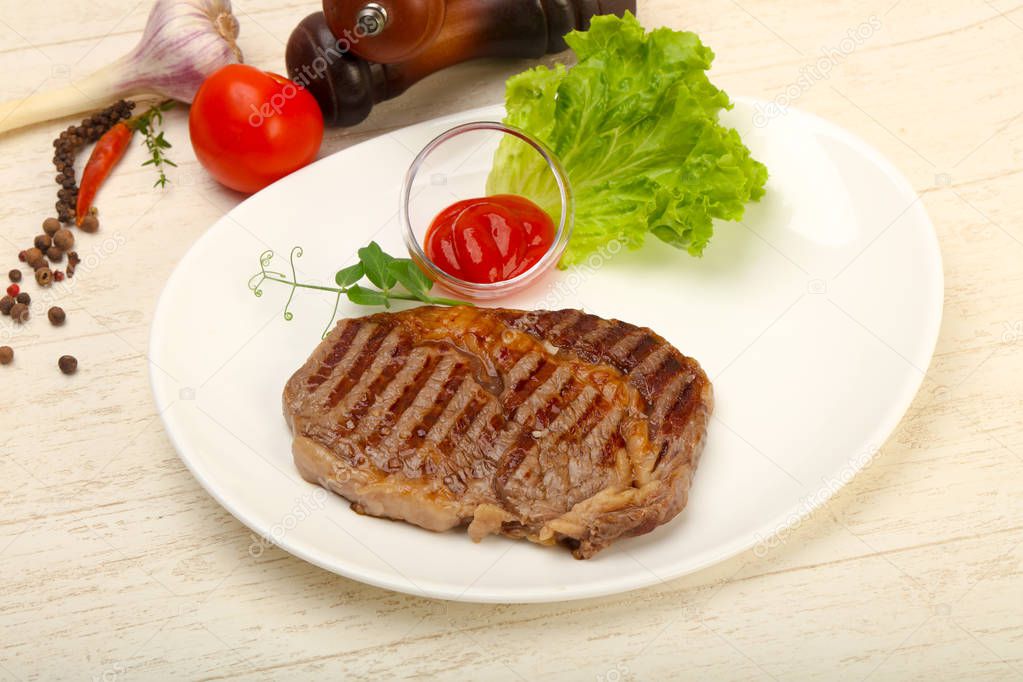 Grilled Rib eye steak with sauce
