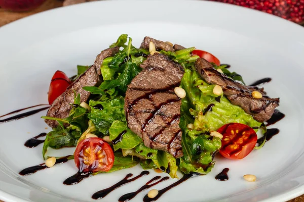 Tasty stake salad with vegetables