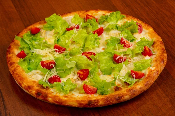 Pizza Caesar with chicken and salad