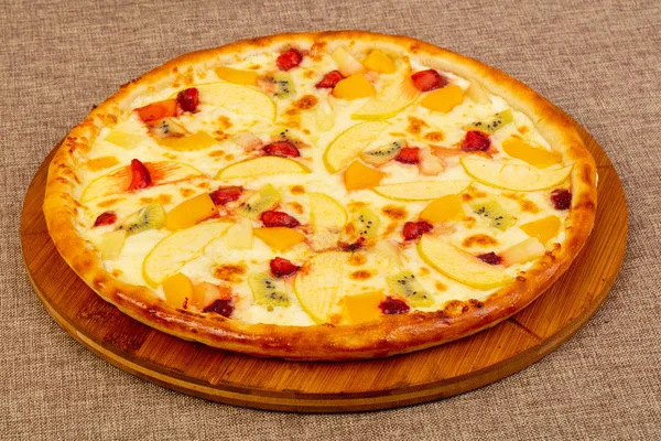 Sweet pizza with apple and kiwi