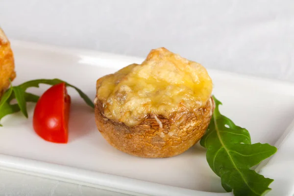 Baked mushrooms champignon with cheese
