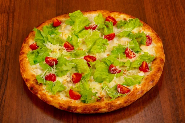 Pizza Caesar with chicken and salad