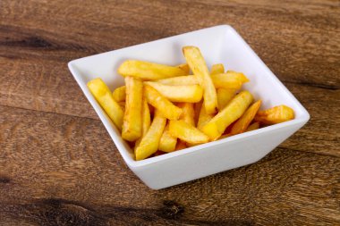 Patates kızartması patates ahşap arka plan üzerinde