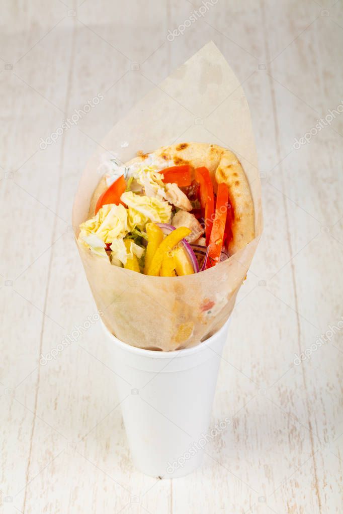 Tasty gyros with tomatos lettuce and meat