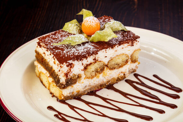 Famous Tiramisu cake served chokolate