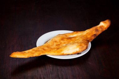 Gürcü sıcak ekmek ahşap arka plan üzerine