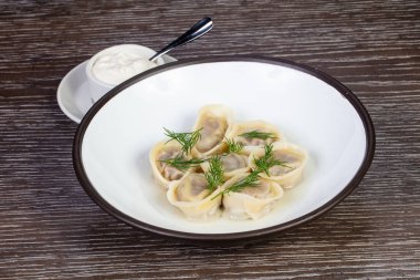 Ekşi kremalı lezzetli ev yapımı hamur tatlısı.