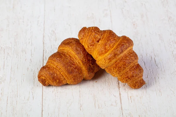Süße Leckere Croissant Über Holz Hintergrund — Stockfoto