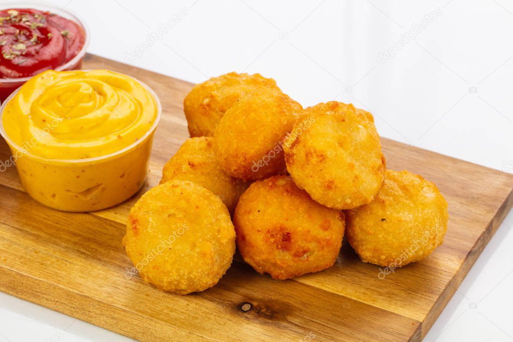 Tasty Chicken nuggets with sauce