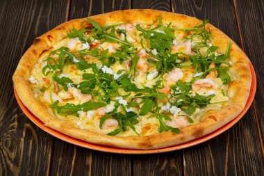 Karides ve rucola pizza