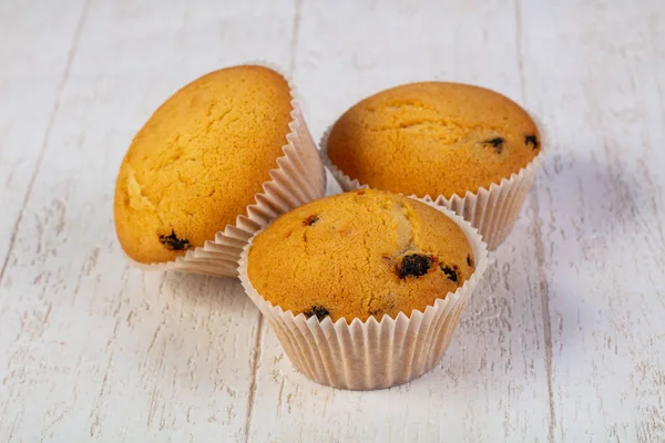 Süße Leckere Muffins Über Holzhintergrund — Stockfoto