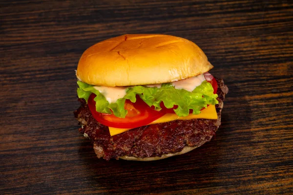 Tasty Hot Burger Wooden Background — Stock Photo, Image