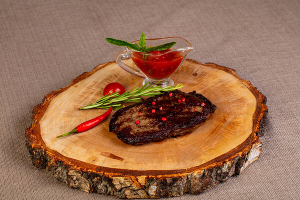 Grilled beef steak with red pepper